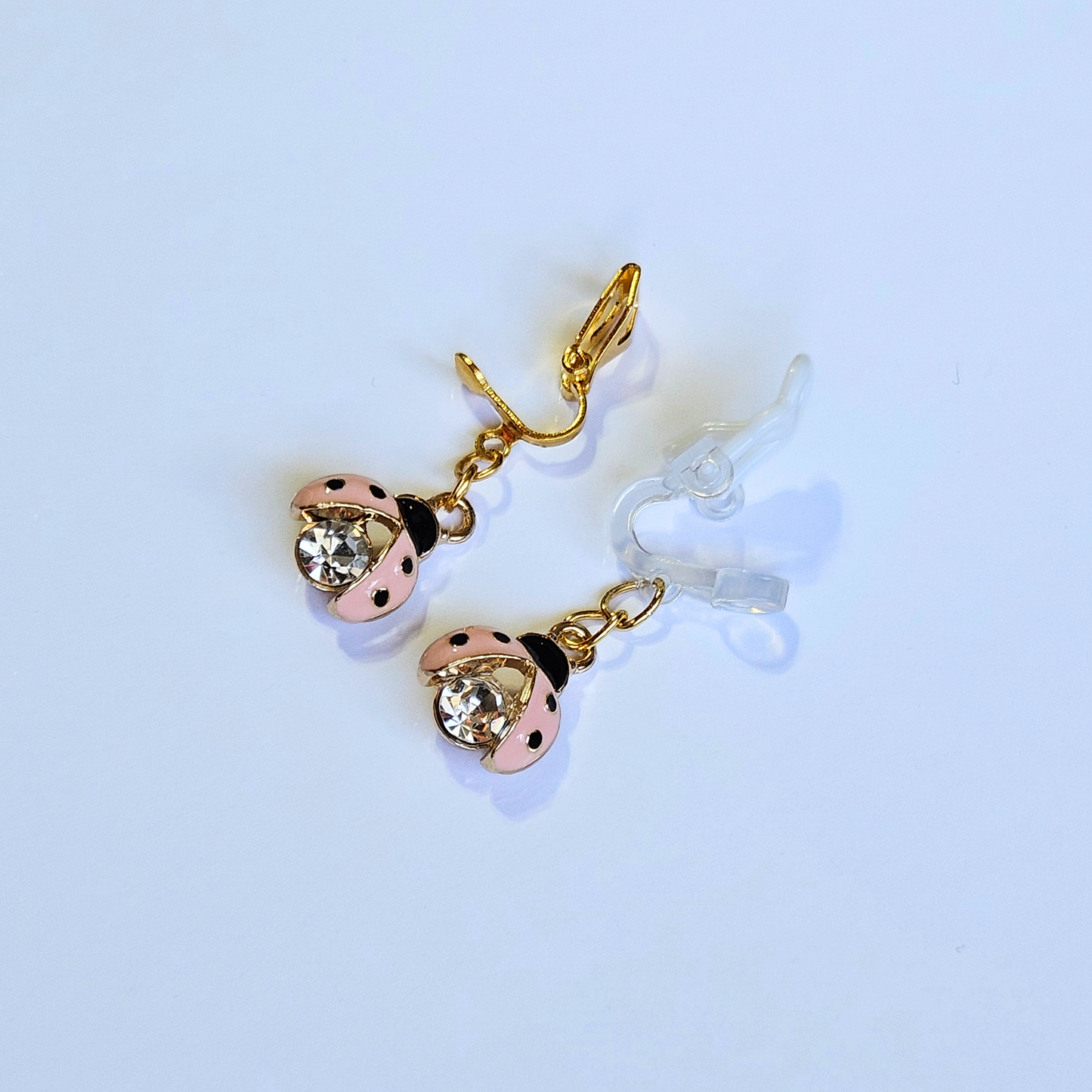 Hypoallergenic pink rhinestone ladybug dangle Clip-On Earrings