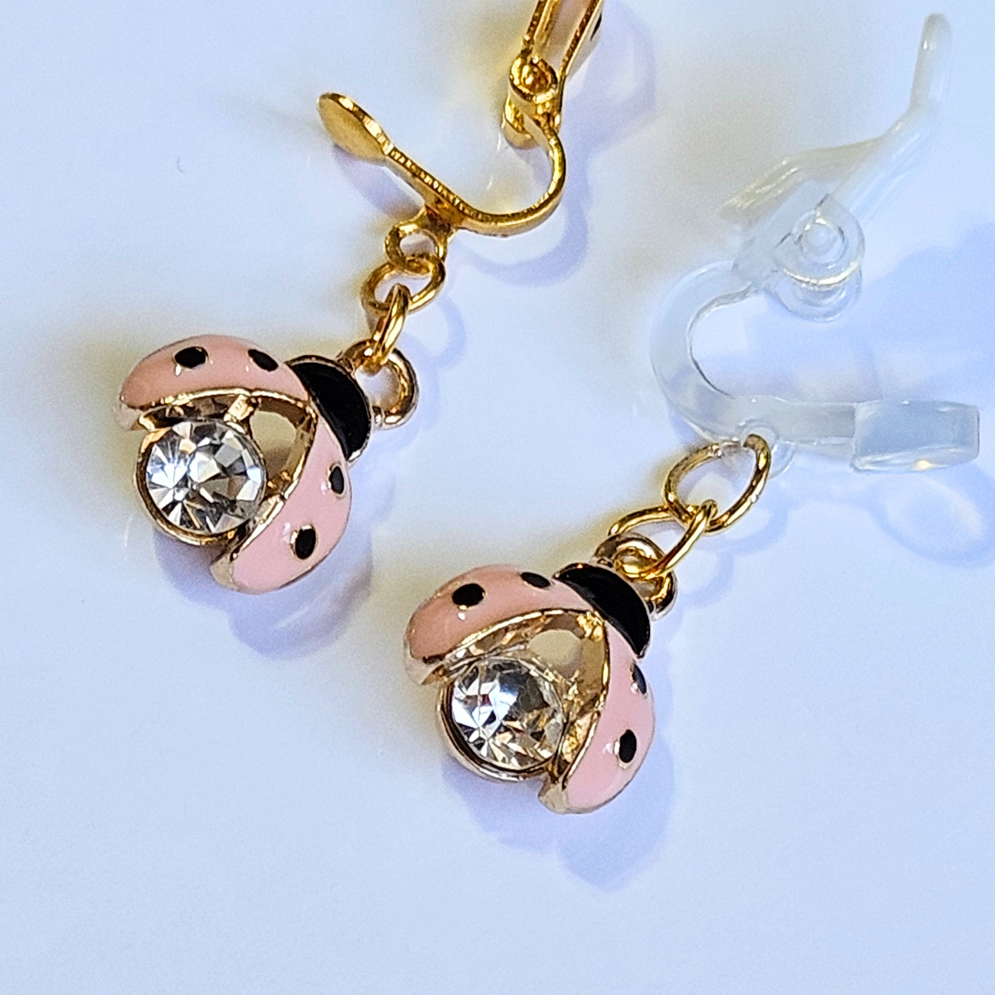 Hypoallergenic pink rhinestone ladybug dangle Clip-On Earrings