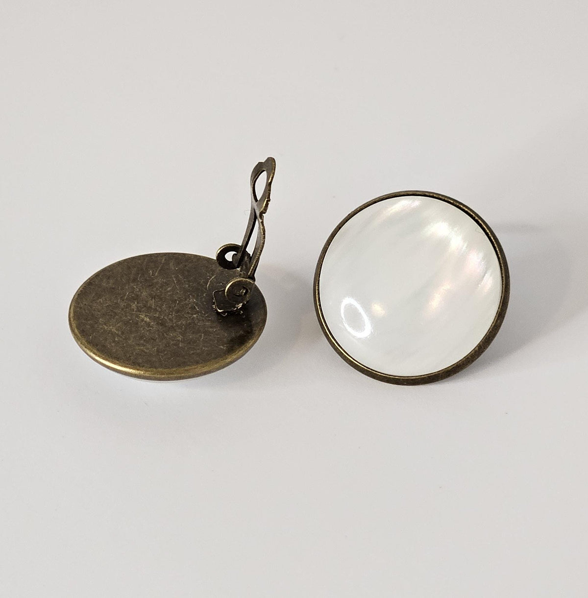 White Round Clip On Earrings: Bronze Tone, Non Piercing